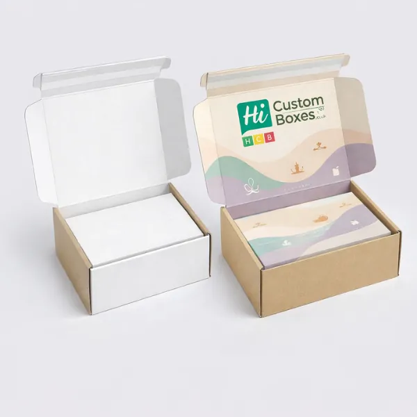 Two open cardboard mailer boxes featuring serene wave patterns and branding on the inner lids- class=